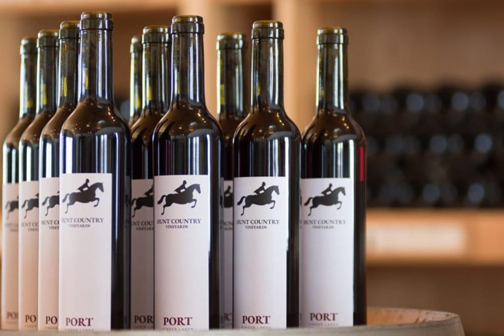 bottles of port lined up on a table at Hunt Country