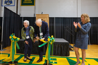Green and gold Ribbon Cutting